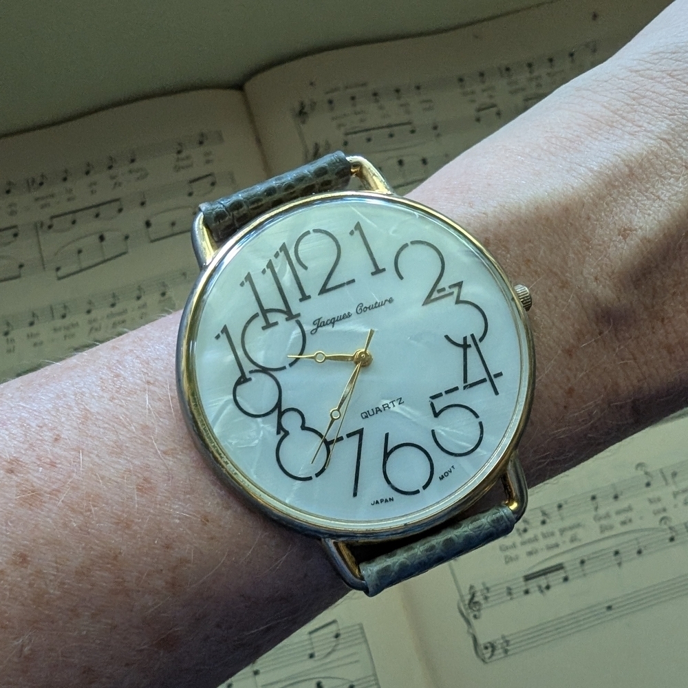 Jacques Couture Gold and Black Watch With Large Face